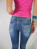Vintage embroidered low rise skinny jeans