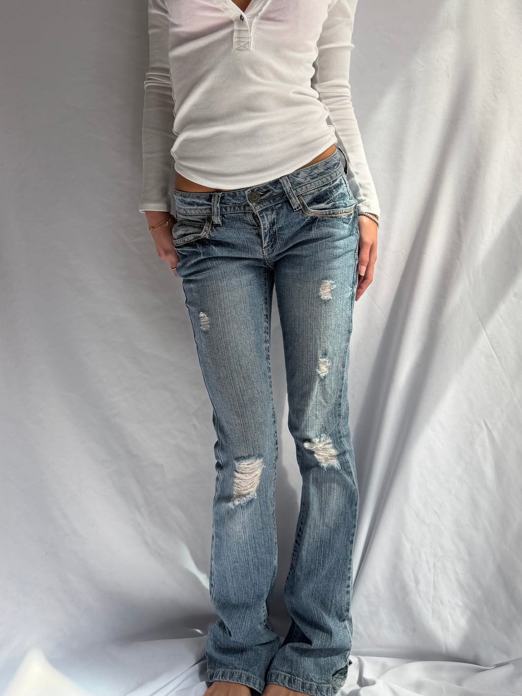 Vintage low rise bootcut ripped jeans