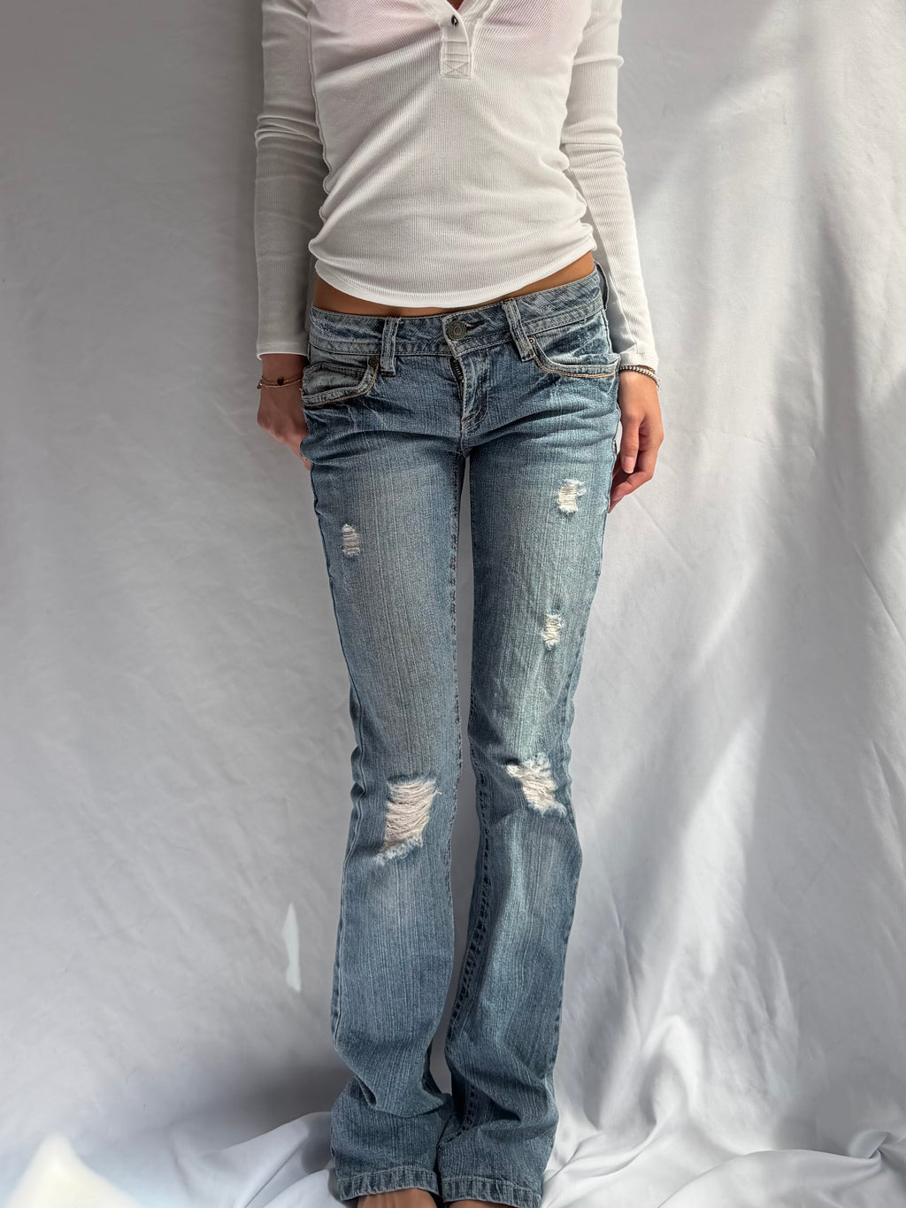 Vintage low rise bootcut ripped jeans