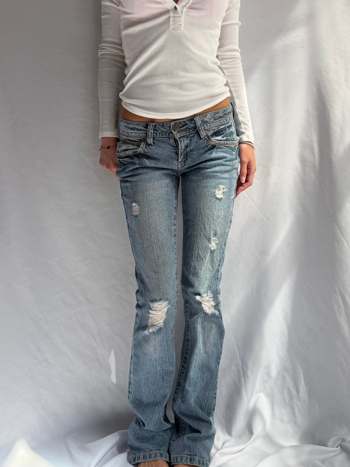 Vintage low rise bootcut ripped jeans