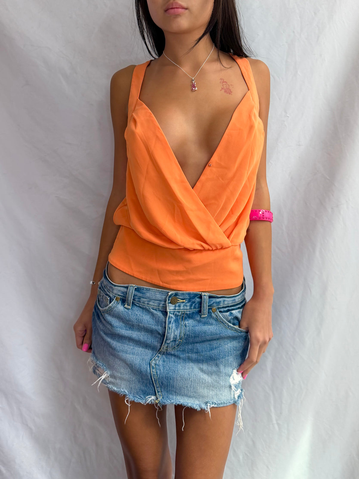 Vintage Bebe orange low cut tank top