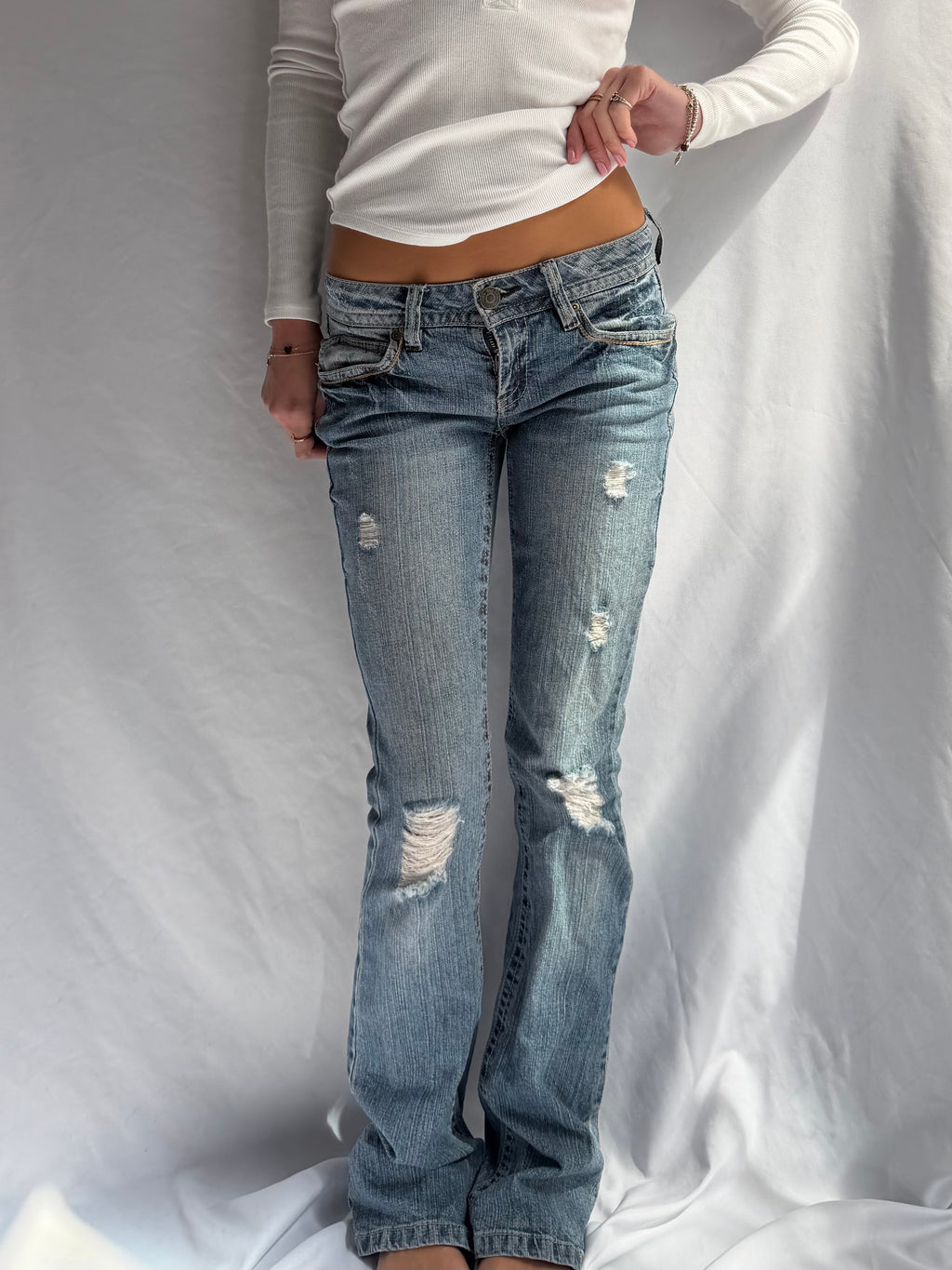 Vintage low rise bootcut ripped jeans