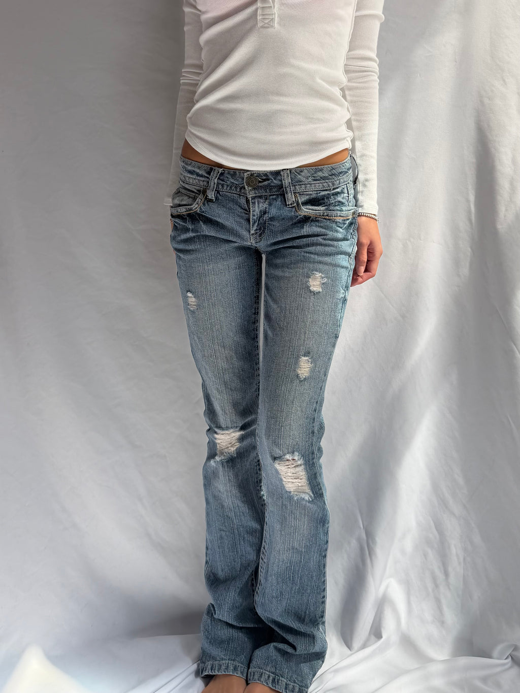 Vintage low rise bootcut ripped jeans