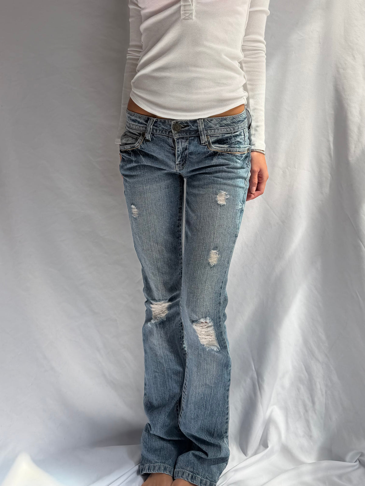 Vintage low rise bootcut ripped jeans